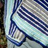 Detail háčkované vesty z vlny The Petite Wool