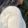 Detail pleteného svetříku z mohérové příze Touch me Mohair